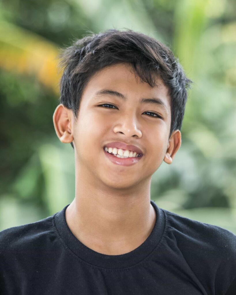 kid with clean teeth and smile