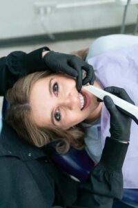 patient in orthodontic chair about to get braces